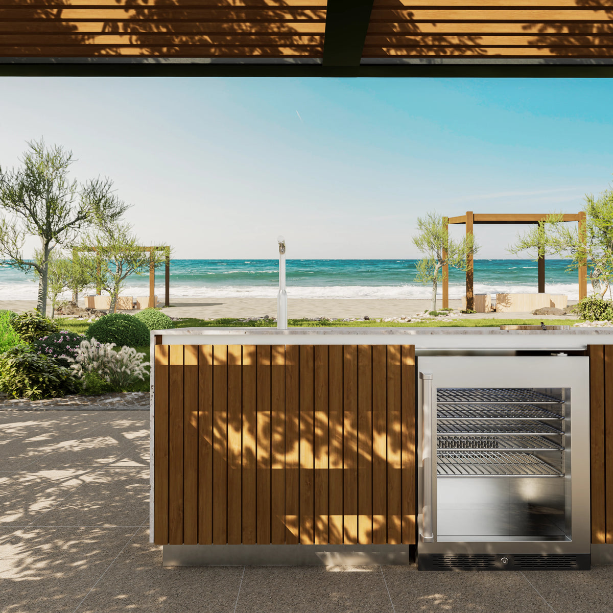 Al Fresco outdoor kitchenette with solid teak cabinetry, a built-in mini fridge and travertine countertop overlooking the sea.