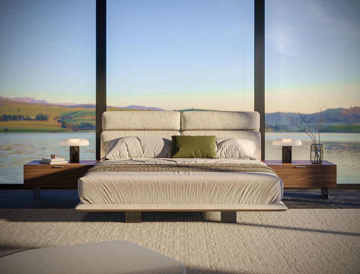 Front view of the beige Chill bed with raised adjustable headrests, an upholstered wall-mounted headboard, and integrated nightstands.