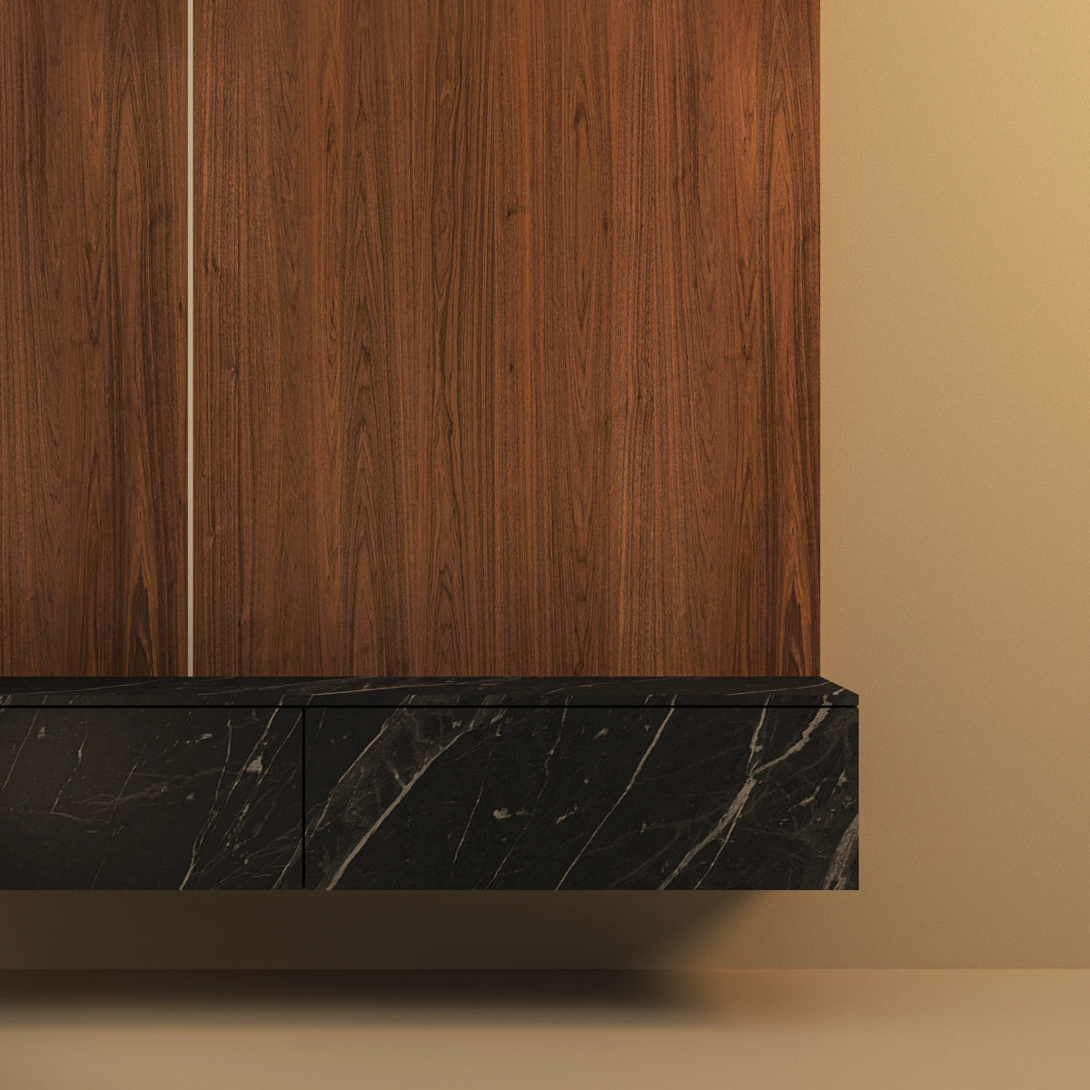 Close-up of the Enzo modular dresser’s black marble-laminate lower drawer beneath walnut veneer cladding.