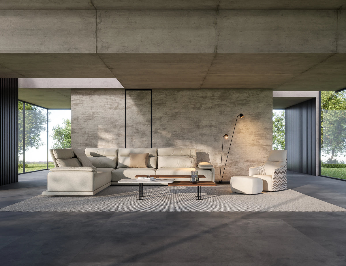 Beige Flexor sectional sofa with a chaise longue, adjustable headrests, lumbar cushions, and padded armrests.