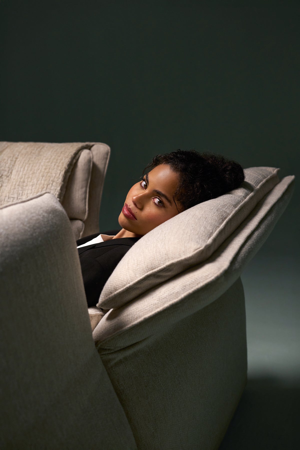 Flexor Sofa with adjustable headrest reclined, showing smooth friction-catch mechanism.