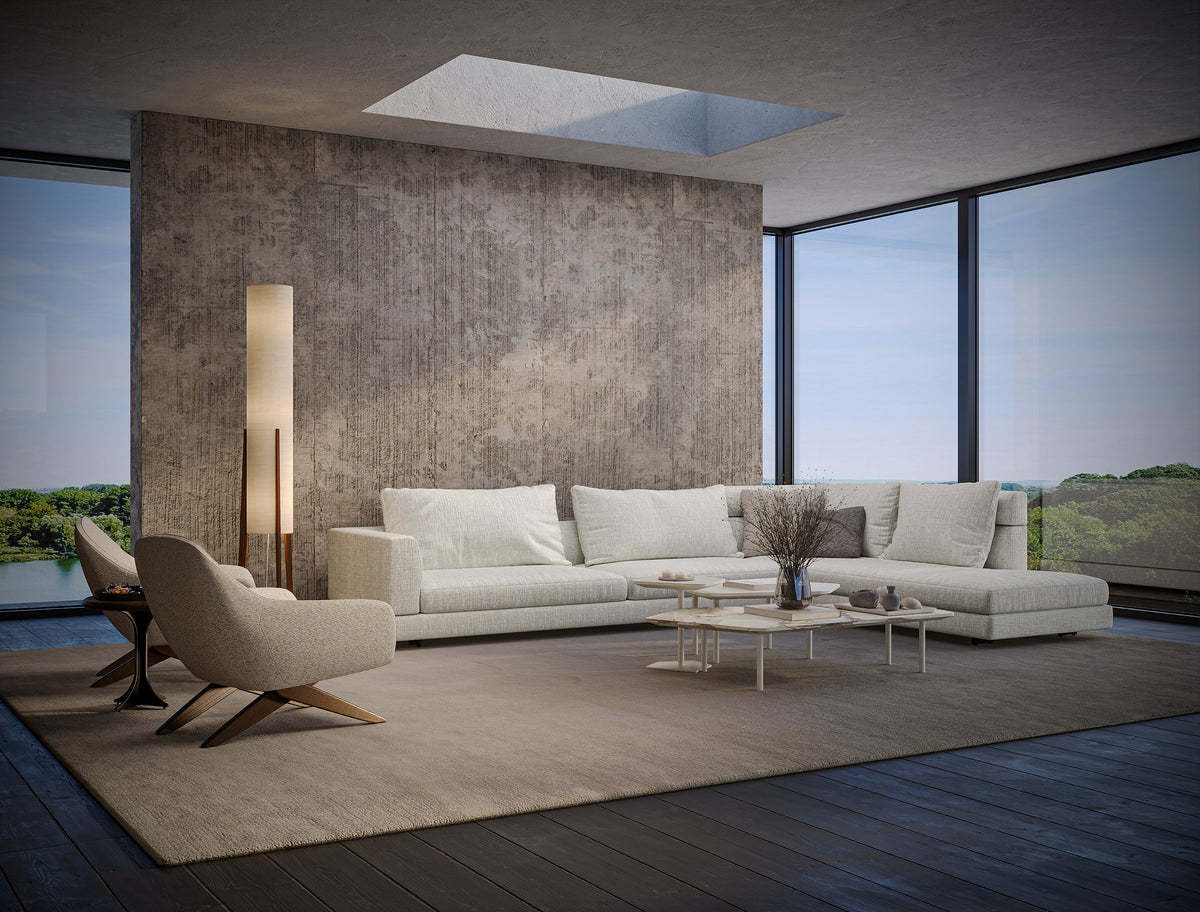 White Monti corner sofa with a chaise module, deep foam seating, feather-filled back cushions, and a low-profile modular layout.