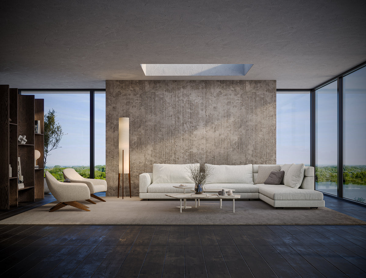Front view of the white Monti modular corner sofa with a chaise, low and high back sections, and feather-filled cushions.