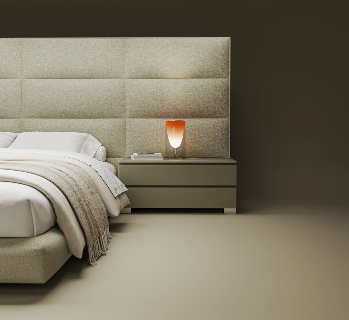 Close-up of the beige Platinum bed’s bombé upholstered cladding and matching two-drawer nightstand.