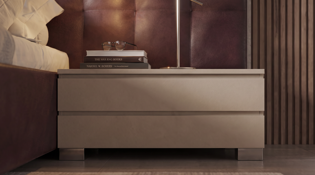 Close-up of the Square bed’s dark brown grid cladding and matching two-drawer nightstand with a bedside lamp.