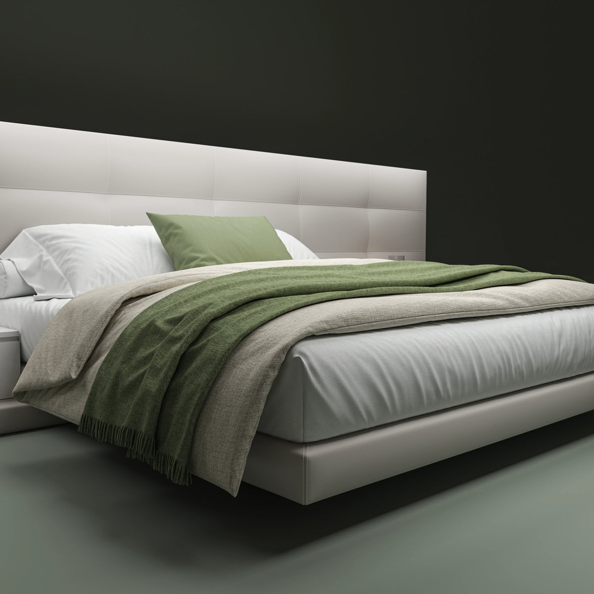 Close angled view of the beige Sublime bed with rectangular tufted cladding, an elevated platform, and green bedding.