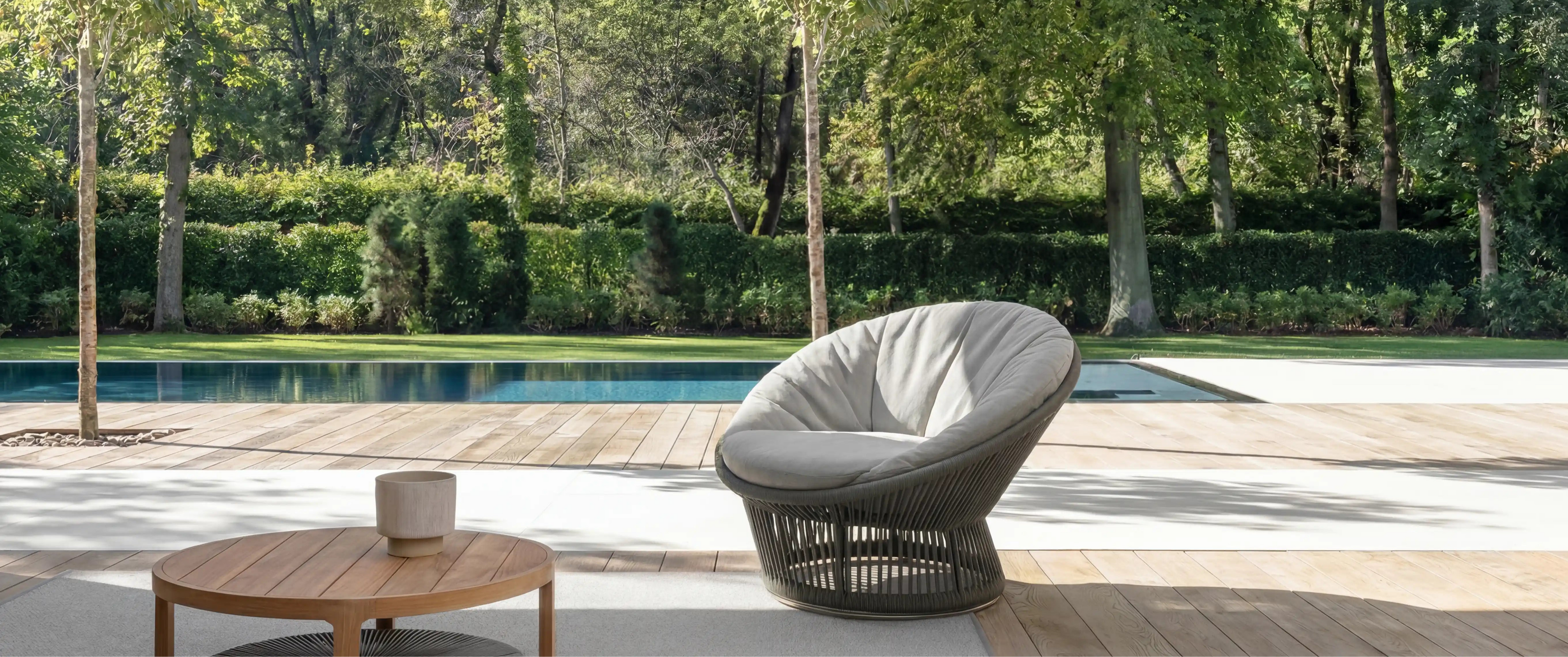 Sun_Outdoor_Armchair_by_the_Pool_7f474a88-2582-45b3-bc2d-4de4e9ccd2b7.webp
